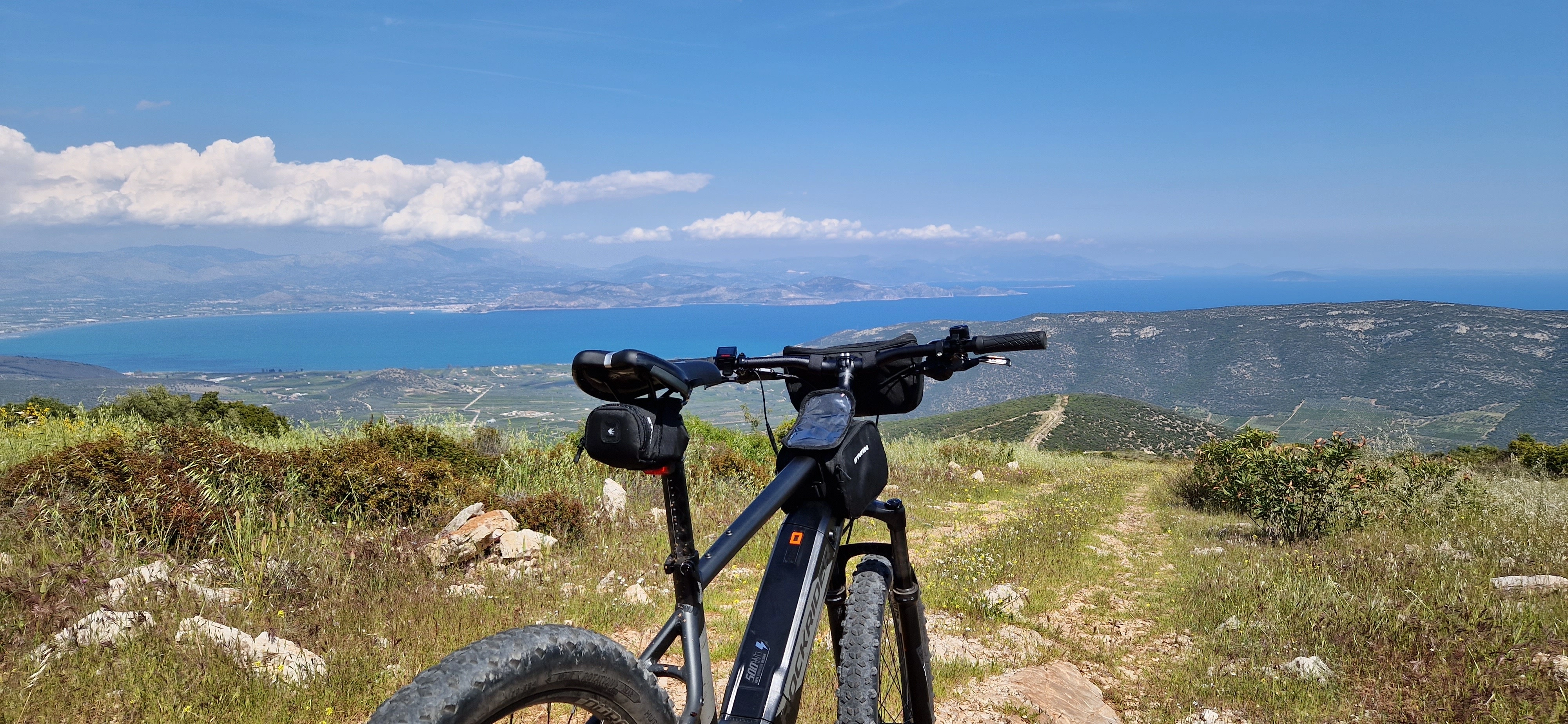 A bicycle on a hilltop overlooking the Argolic Gulf